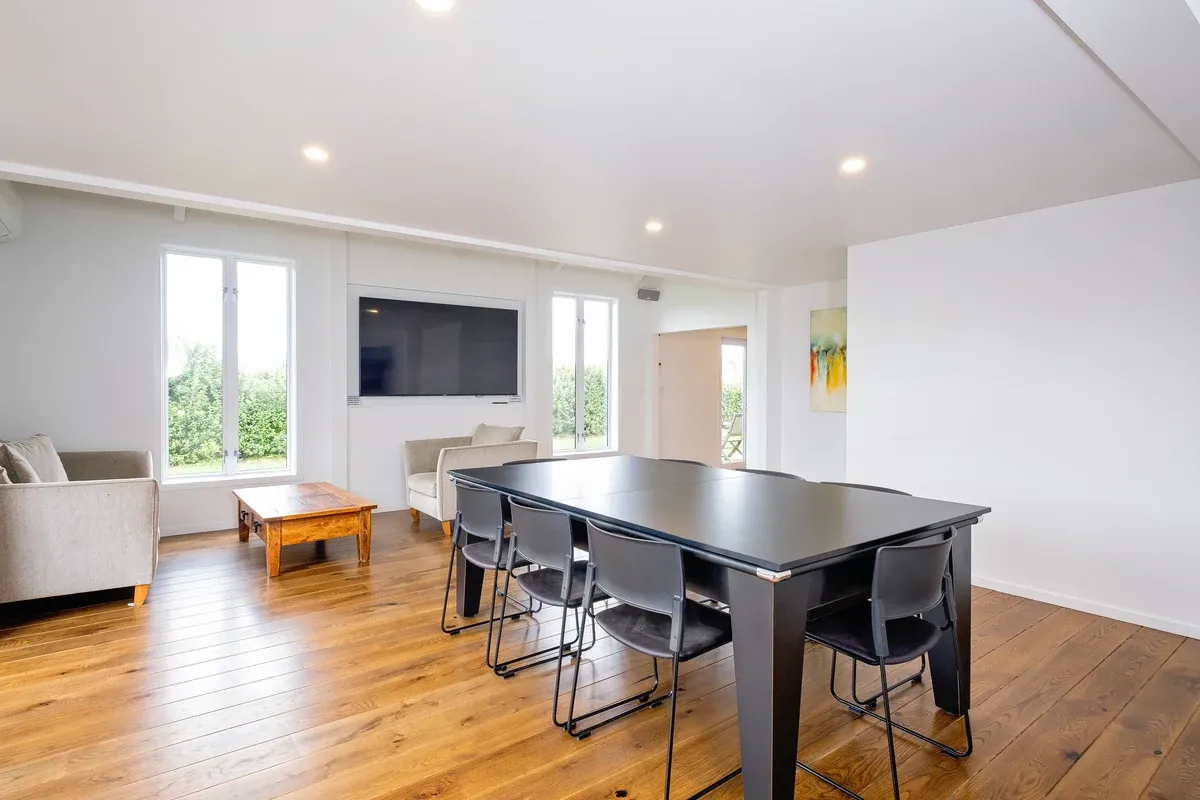 Meeting room table and chairs at Lawn Road Retreat