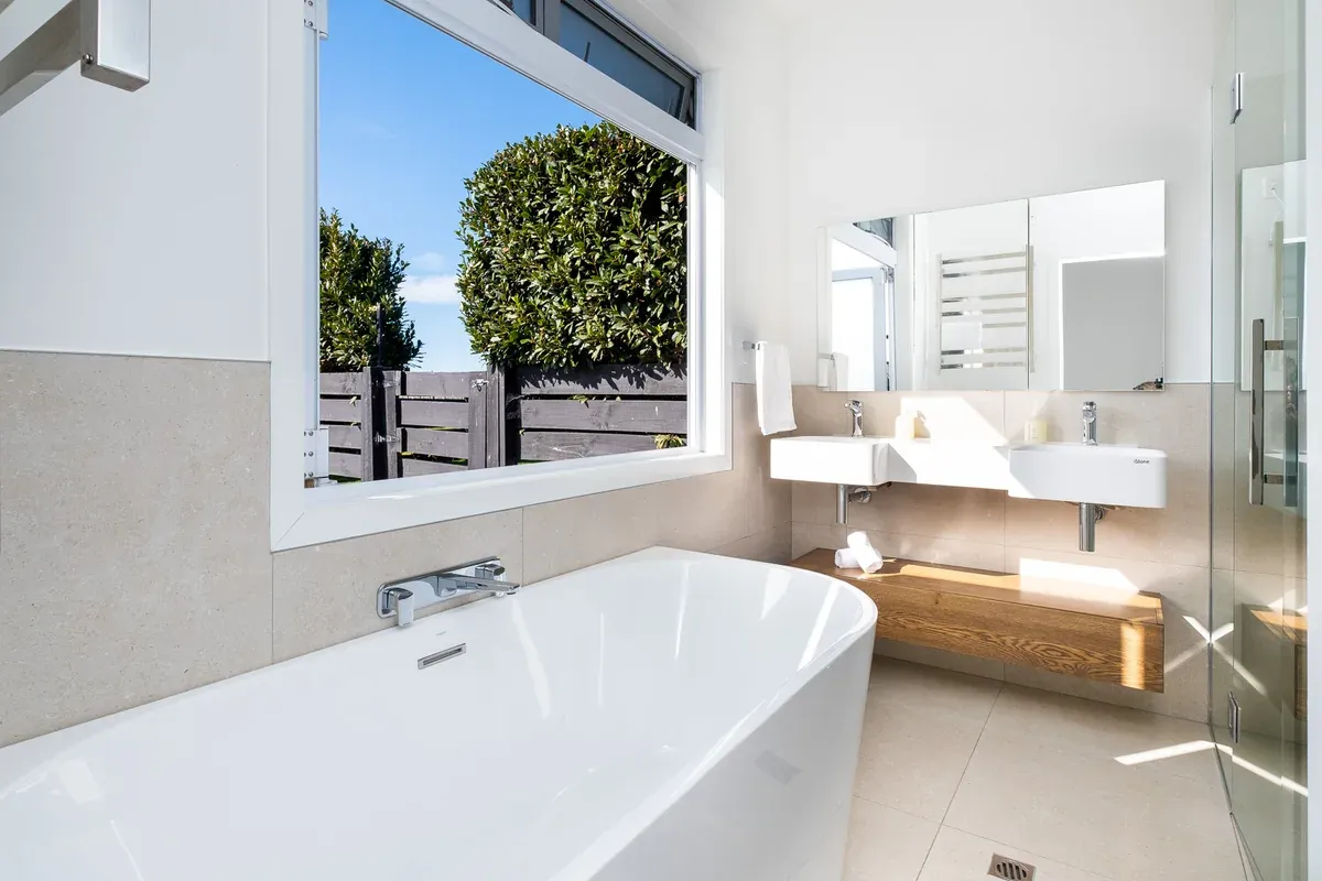 Bathroom with freestanding bath at Lawn Road Retreat, Hawke's Bay
